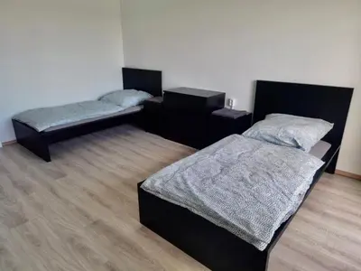 Ein Bett oder Betten in einem Zimmer der Unterkunft 5 Betten Monteurwohnung in Zeithain