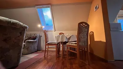 Ein Sitzbereich in der Unterkunft Ferienwohnung Altes Forsthaus Sächsische Schweiz