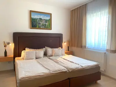 Ein Bett oder Betten in einem Zimmer der Unterkunft Ferienwohnung Felsblick Neue Schänke