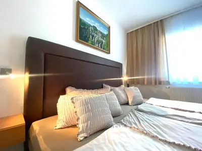Ein Bett oder Betten in einem Zimmer der Unterkunft Ferienwohnung Felsblick Neue Schänke