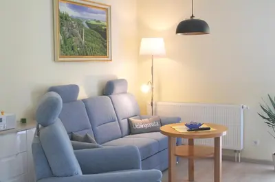 Ein Sitzbereich in der Unterkunft Ferienwohnung Felsblick Neue Schänke