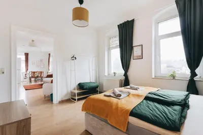 Ein Bett oder Betten in einem Zimmer der Unterkunft Heideblick Apartment Dresden WIFI Netflix