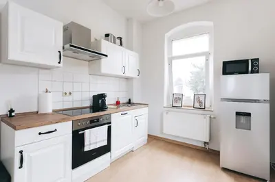 Küche/Küchenzeile in der Unterkunft Heideblick Apartment Dresden WIFI Netflix