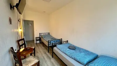 Ein Bett oder Betten in einem Zimmer der Unterkunft MiCasa TuCasa - 3-R Apartment Leipziger Neuseenland Mira