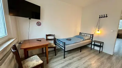 Ein Bett oder Betten in einem Zimmer der Unterkunft MiCasa TuCasa - 3-R Apartment Leipziger Neuseenland Mira