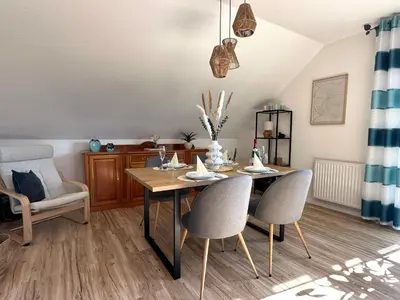 Ein Sitzbereich in der Unterkunft Ferienwohnung Glücksklee