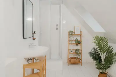Ein Badezimmer in der Unterkunft JINO Königstein l Elbblick - WLAN - stilvoll