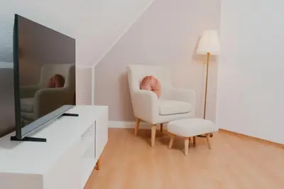 TV/Unterhaltungsangebot in der Unterkunft JINO Königstein l Elbblick - WLAN - stilvoll