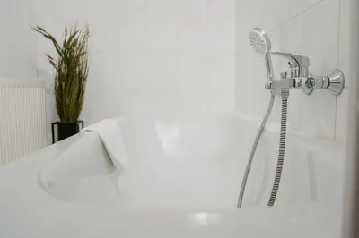 Ein Badezimmer in der Unterkunft JINO Königstein l Elbblick - WLAN - stilvoll