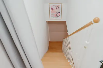 Ein Bett oder Betten in einem Zimmer der Unterkunft JINO Königstein l Elbblick - WLAN - stilvoll