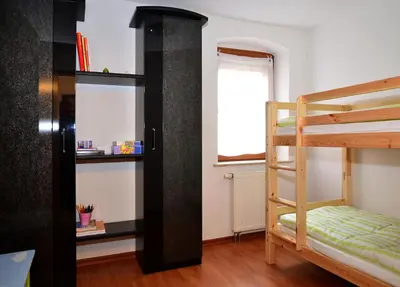 Ein Bett oder Betten in einem Zimmer der Unterkunft FeWo - 