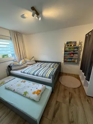 Ein Bett oder Betten in einem Zimmer der Unterkunft NEU! Ferienhaus am Sonnenlandpark - Haus Anja