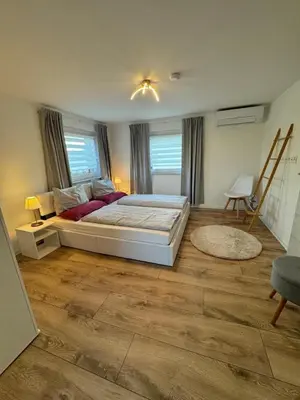 Ein Bett oder Betten in einem Zimmer der Unterkunft NEU! Ferienhaus am Sonnenlandpark - Haus Anja