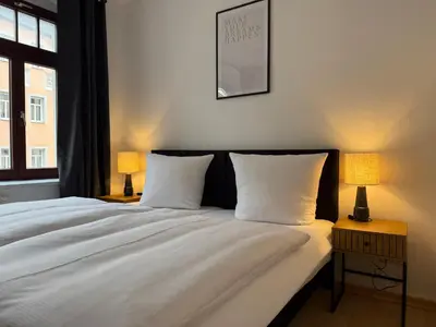Ein Bett oder Betten in einem Zimmer der Unterkunft 4 sleep Apartments KARL