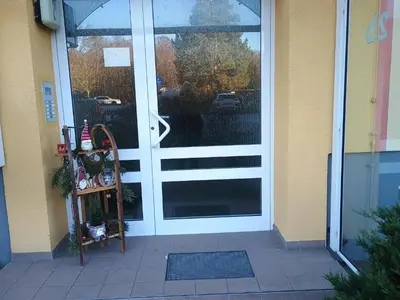 Eine Fassade oder ein Eingang zu Ferien Oase