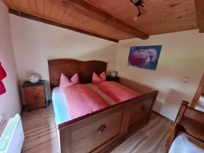 Ein Bett oder Betten in einem Zimmer der Unterkunft Porschendorfer Mühle