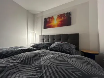 Ein Bett oder Betten in einem Zimmer der Unterkunft Ferienhaus Emma Dresden Hellerau