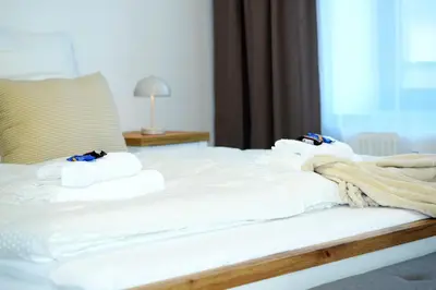Ein Bett oder Betten in einem Zimmer der Unterkunft ASYA HOME Zentral, Balkon, Netflix, Gratis Kaffee und Tee