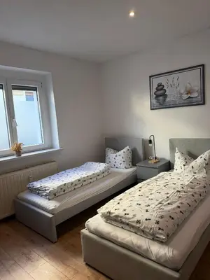 Ein Bett oder Betten in einem Zimmer der Unterkunft Ferienwohnung Schwarze Elster