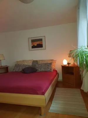 Ein Bett oder Betten in einem Zimmer der Unterkunft Ferienhaus Storchennest
