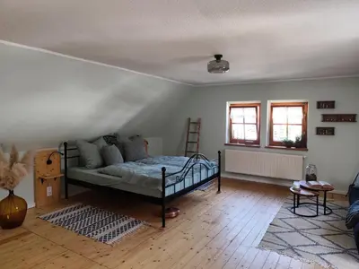 Ein Bett oder Betten in einem Zimmer der Unterkunft Ferienhaus 