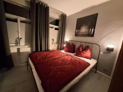 Ein Bett oder Betten in einem Zimmer der Unterkunft Ferienwohnung im Zschopauer Herzen