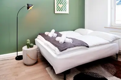 Ein Bett oder Betten in einem Zimmer der Unterkunft schickes Apartment 5 min vom Hbf der Kulturhauptstadt 2025