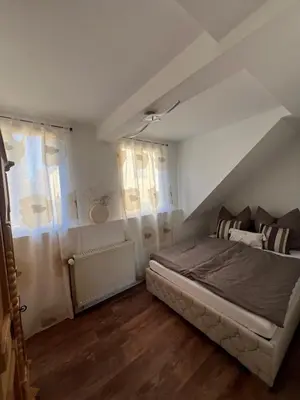 Ein Bett oder Betten in einem Zimmer der Unterkunft Zur Blume
