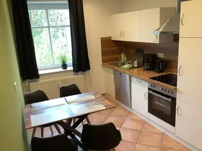 Küche/Küchenzeile in der Unterkunft Ferienwohnung am Bienertpark