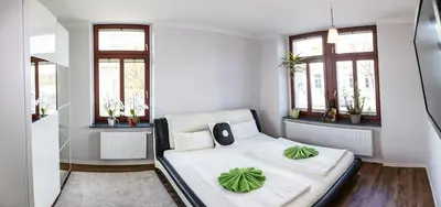 Ein Bett oder Betten in einem Zimmer der Unterkunft DD Apartments