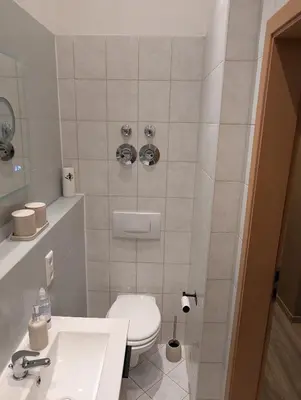 Ein Badezimmer in der Unterkunft Helle Ferienwohnung Schloßchemnitz - New Apartment