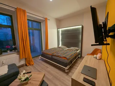 TV/Unterhaltungsangebot in der Unterkunft Helle Ferienwohnung Schloßchemnitz - New Apartment