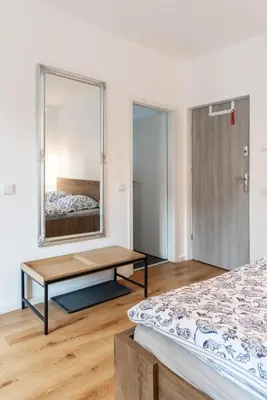 Ein Bett oder Betten in einem Zimmer der Unterkunft Mini Apartment für 2