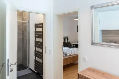 Ein Bett oder Betten in einem Zimmer der Unterkunft Kleines Apartment für 3