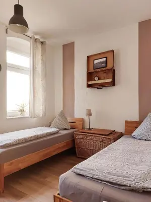 Ein Bett oder Betten in einem Zimmer der Unterkunft Gästehaus Wagner
