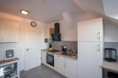 Küche/Küchenzeile in der Unterkunft Apartment in Schloßchemnitz l Aufzug l W-Lan l Badewanne