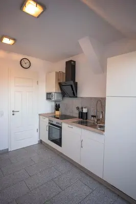Küche/Küchenzeile in der Unterkunft Apartment in Schloßchemnitz l Aufzug l W-Lan l Badewanne