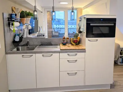 Küche/Küchenzeile in der Unterkunft Der Zwergenbau - modernes Wohnen mit Schlossblick