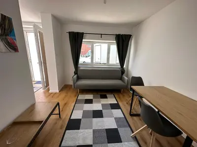 Ein Sitzbereich in der Unterkunft Barrierearmes Mini Apartment