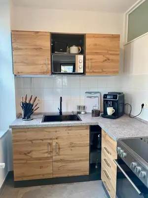 Küche/Küchenzeile in der Unterkunft Stilvolles City-Apartment Dresden-Cotta mit Balkon