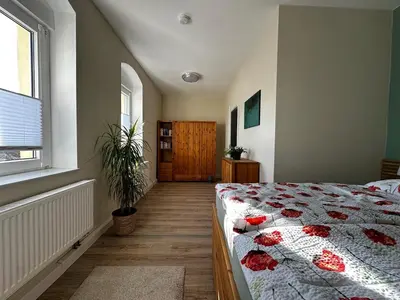 Ein Bett oder Betten in einem Zimmer der Unterkunft Ferienwohnung Dahlen mit familienfreundlichem Garten