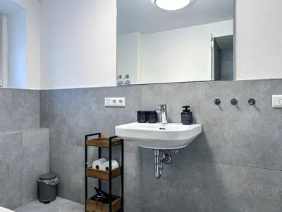 Ein Badezimmer in der Unterkunft Westpromenade No 6
