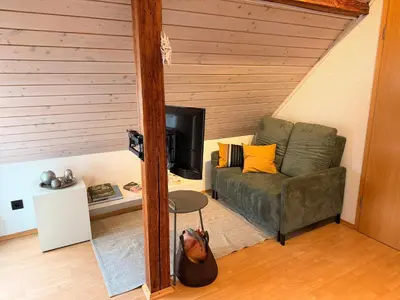 Ein Sitzbereich in der Unterkunft Modernes 1-Raum-Apartment