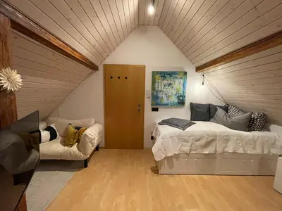 Ein Bett oder Betten in einem Zimmer der Unterkunft Modernes 1-Raum-Apartment