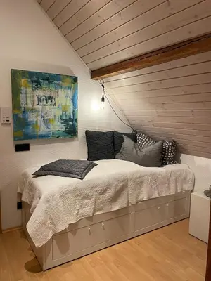 Ein Bett oder Betten in einem Zimmer der Unterkunft Modernes 1-Raum-Apartment
