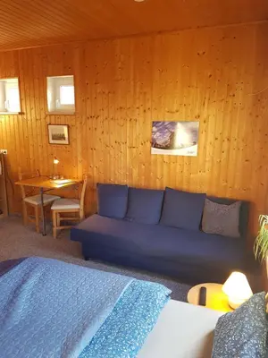 Ein Sitzbereich in der Unterkunft Ferienhaus Hankehübel