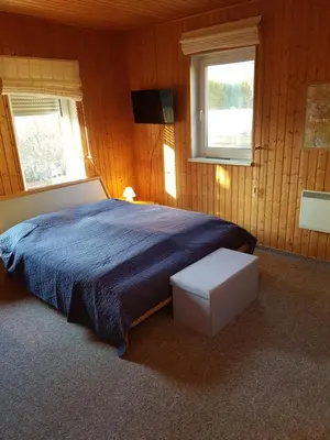 Ein Bett oder Betten in einem Zimmer der Unterkunft Ferienhaus Hankehübel