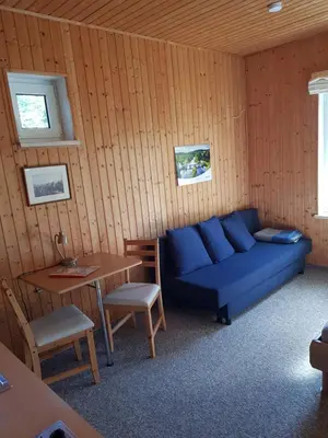 Ein Sitzbereich in der Unterkunft Ferienhaus Hankehübel