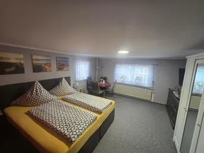 Ein Bett oder Betten in einem Zimmer der Unterkunft Ferienwohnung Heike Rinno