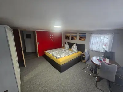 Ein Bett oder Betten in einem Zimmer der Unterkunft Ferienwohnung Heike Rinno